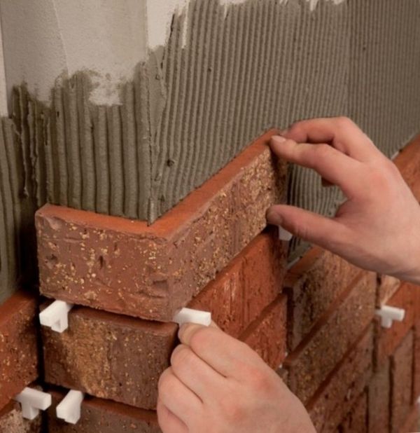 Облицовка камина керамической плиткой своими руками: как выбрать керамическую плитку, технология укладки, фото - отделка камина облицовочной плиткой
